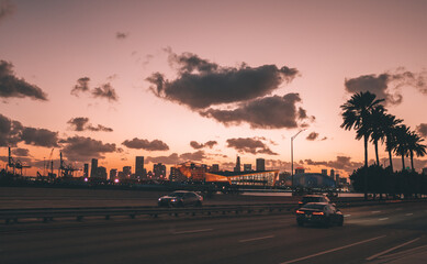 sunset in the city road cars sky clouds miami usa florida 