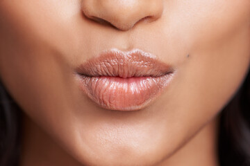 Obraz premium And one for you. Cropped shot of a womans beautiful lips.