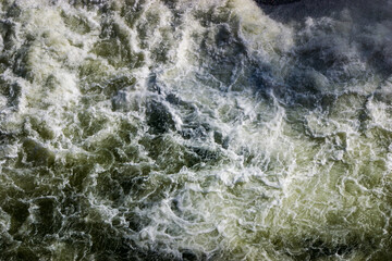 Naklejka premium Turbulent whitewash of water downstream from pressure outlet at Lake Hume dam
