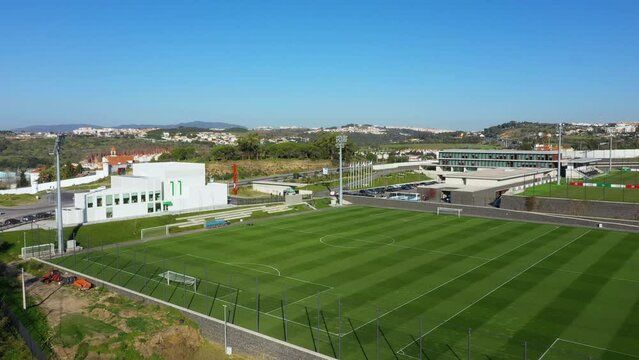 Aerial view of the Cidade do Futebol , at the Jamor Stadium Sports Complex, in Lisbon, Portugal - tracking, drone shot
