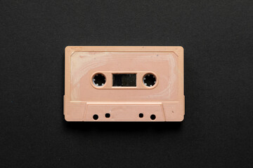 Vintage audio cassette on black background