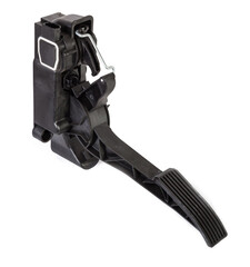 Floor gas pedal on a white isolated background in a photo studio for sale in a car service. Black...