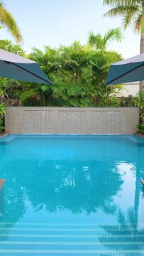 Swimming pool waterfall