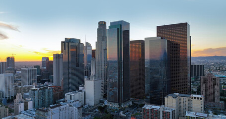 Fototapeta na wymiar Sunset over Los Angeles downtown. Los Angels downtown skyline, panoramic city skyscrapers.
