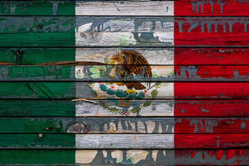 The national flag of Mexico. is painted on uneven boards. Country symbol.