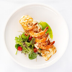 omelet with shrimps and salad