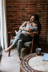Portrait of hispanic mother and daughter having fun at home in Mexico Latin America