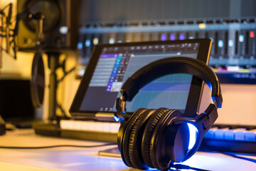 Plakat headphones in the recording room 