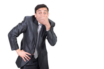 Talkative man in suit covering mouth with hand - obrazy, fototapety, plakaty