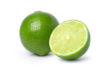 Fresh green lime fruit and cut in half sliced isolated on white background.