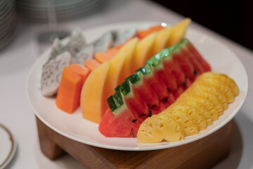 fresh mix fruits on dish, watermelon with pineapple
