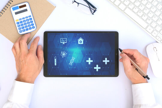 Medical business graph and data on lablet, investment, financial and banking, and medical business report on worldwide network - Powered by Adobe