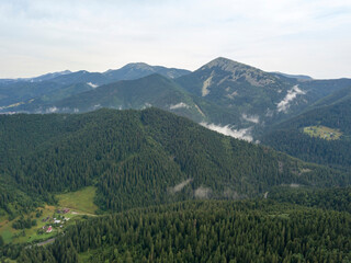 Fototapeta na wymiar Green mountains of Ukrainian Carpathians in summer. Aerial drone view.