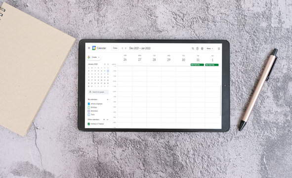 Calendar app on tablet on desk office