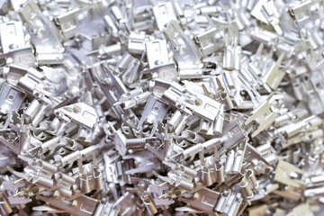 Electronic Industry Concepts. Batch of Silver Tinned External Connectors For PCB Placed Bulk On White.