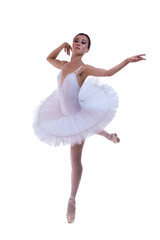 Ballet Dance Concepts. Professional Japanese Female Ballet Dancer Posing in White Tutu in Dance Pose With Lifted Hands Against White Background.