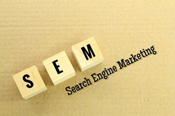 wooden cubes with the letters SEM or the word search engine marketing