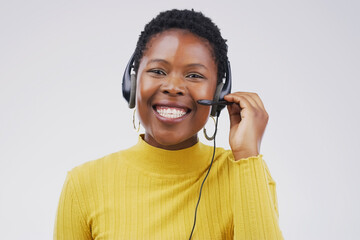 Confident call centre agents create confident customers. Studio portrait of an attractive young...