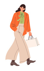 Stylish walking woman in wide-legged pants, jacket and blouse