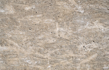 Texture of a concrete wall with cement plaster. Construction works.