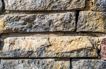 Texture of stone wall or paved road. Part of a stone wall for background or texture. Grunge.