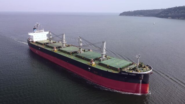 Large general cargo ship tanker bulk carrier, Top down aerial view.	