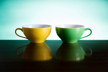 yellow and green tea cups 
