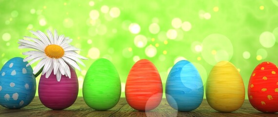 Ein Oster-Banner mit Ostereiern und Margerite im Grünen