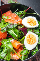 salmon easter salad green leaves egg lettuce healthy meal food diet snack on the table copy space food background 