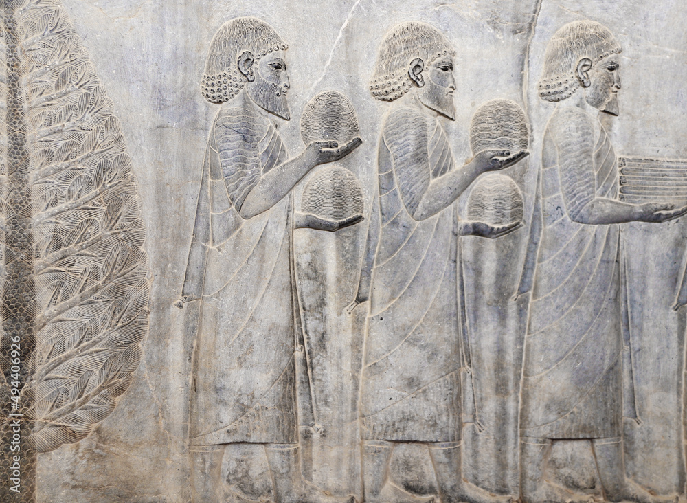 Poster Ancient wall with bas-relief with assyrian foreign ambassadors with gifts and donations, Persepolis, Iran