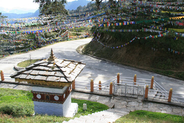 buddhist monument (druk wangyal chortens) at dochula pass in bhutan - obrazy, fototapety, plakaty