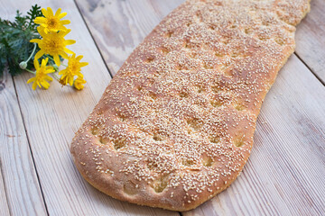 Bread with sesame, without dough, Greek traditional bread called lagana, for the Clean Monday