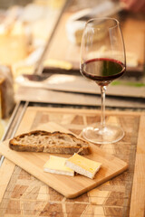 red wine served with cheese and bread 