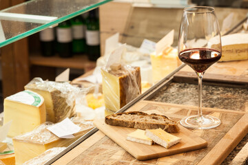 red wine served with cheese and bread 