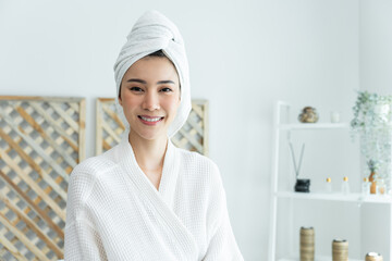 Portrait of Asian client woman looking at camera after doing therapy. 