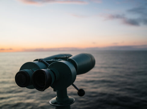 binoculars on sunset