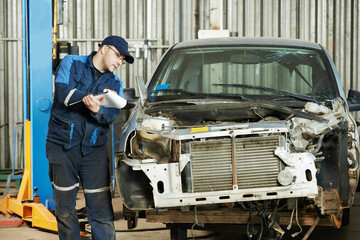 Fototapeta na wymiar worker at car repair determination