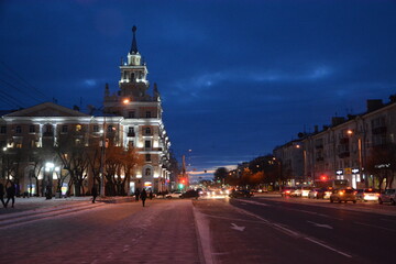 Residential building with a tower in the evening light in the city of Komsomolsk-on-Amur
