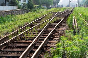 Cargo train platform at sunset with container