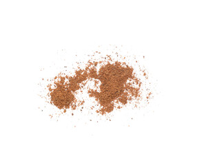 Heap of nutmeg powder on white background, top view