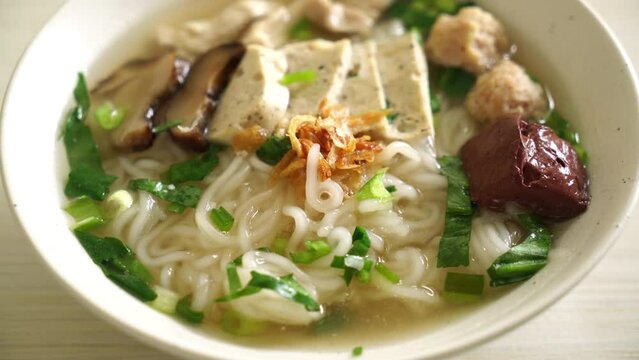 Vietnamese Rice Noodles Soup with Vietnamese Sausage served vegetables and crispy onion - Asian food style