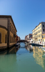 Canals, bridges and buildings in the city of Venice Italy. classic buildings, blue water canals.