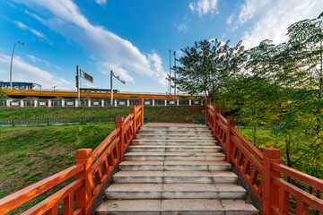 stairs with handrails on both sides in a park
