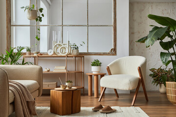 Stylish compositon of modern living room interior with frotte armchair, sofa, plants, wooden commode, side table and elegant home accessories. Home staging. Template. Copy space.