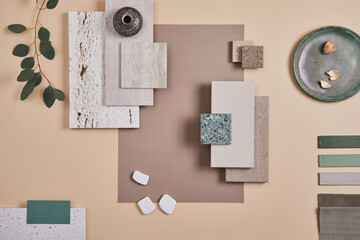 Creative flat lay composition of interior designer moodboard with textile and paint samples, panels...