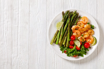 toasty asparagus with fried prawns, lime and salad