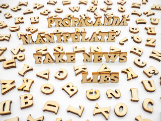 wooden letters spread among words