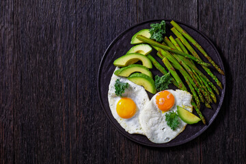 roast asparagus, ripe avocado and fried eggs