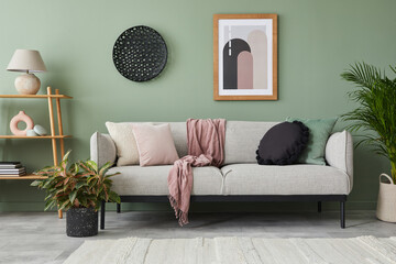 Stylish composition of modern living room interior. Mock up poster frame, wooden shelf, modern sofa...