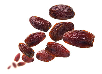 Dried dates levitate on a white background